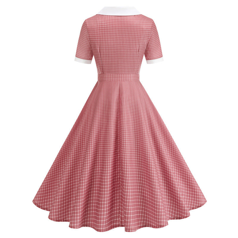 Dame Vintage Polka-Dot Kjole med knappdetaljer og svajende skjørt Skjora