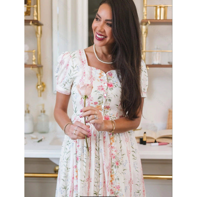 Dame Maxikjole med blomsterdesign og lange puffermar