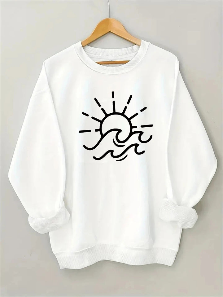 Dame sweatshirt med kreativ sol- og bølgedesign Skjora