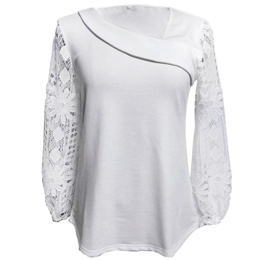 Dame designerbluse med blonder og elegant snitt Skjora