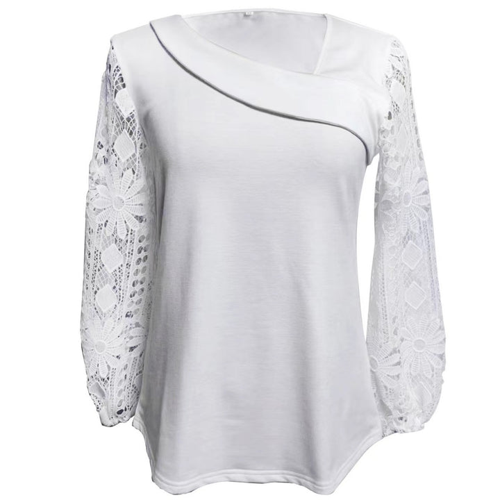 Dame designerbluse med blonder og elegant snitt Skjora