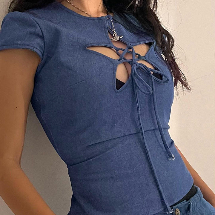 Dameoverdel med unikt cut-out-design og elegant snøring Skjora
