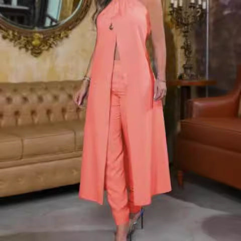 Dame Elegant to-delt sett med stilfull kåpe og cropped bukser Skjora