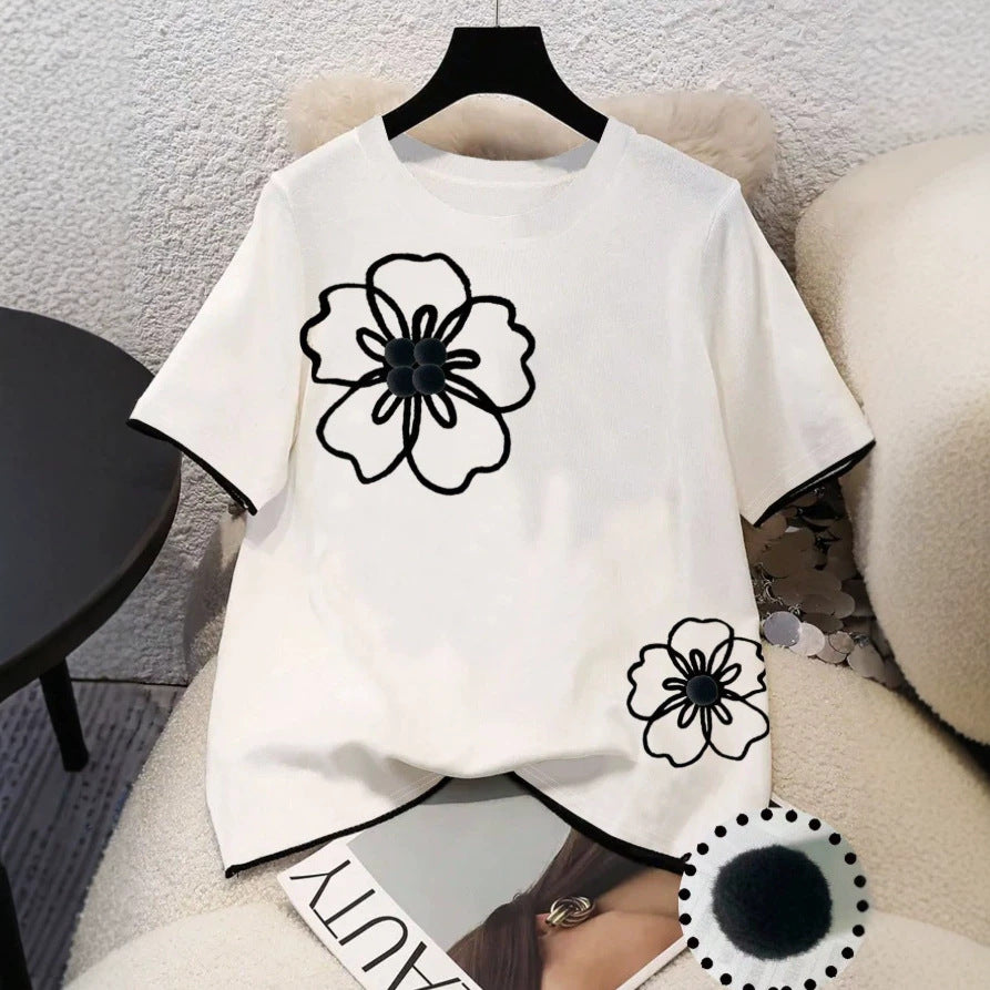 Dame T-skjorte med blomstret design og løs passform Skjora