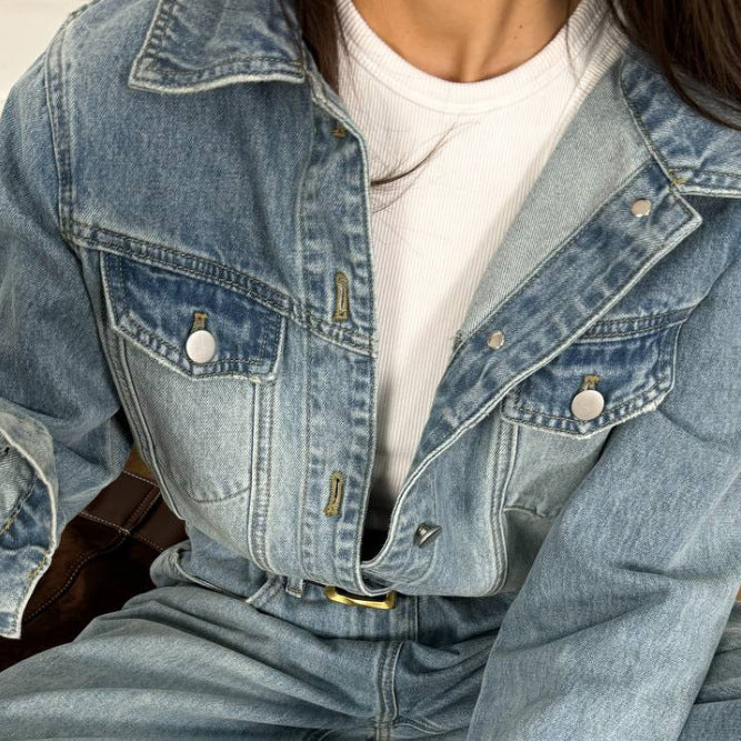 Kvinne denim jumpsuit med justerbart belte og vide ben Skjora