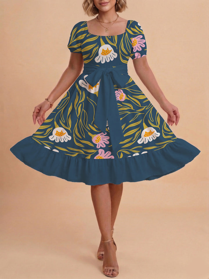 Damen Sommerliches Blumenkleid mit taillierbarem Gürtel und voluminösen Ärmeln Skjora