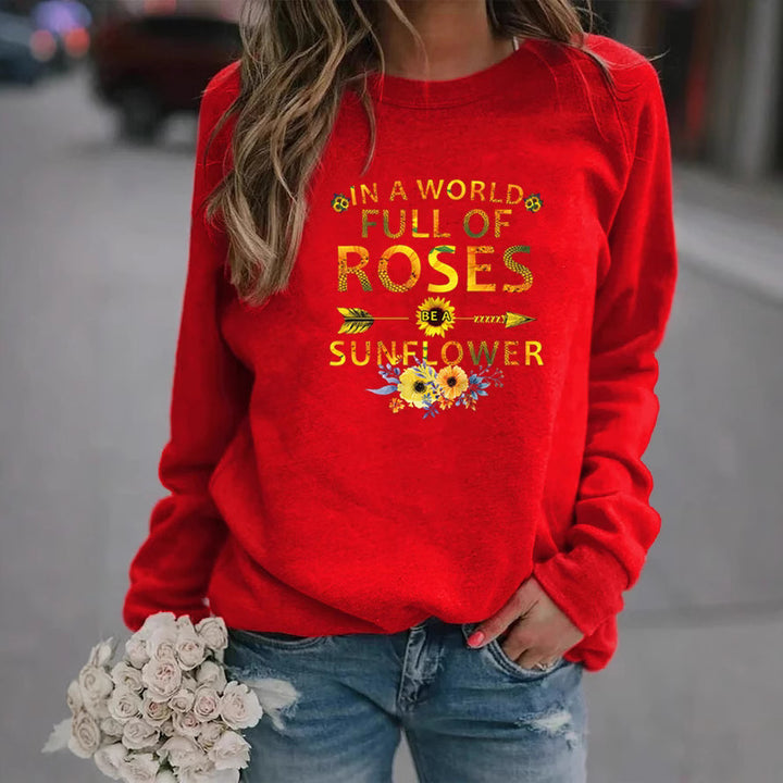 Dame sweatshirt med inspirerende design og blomsterdekorasjon Skjora