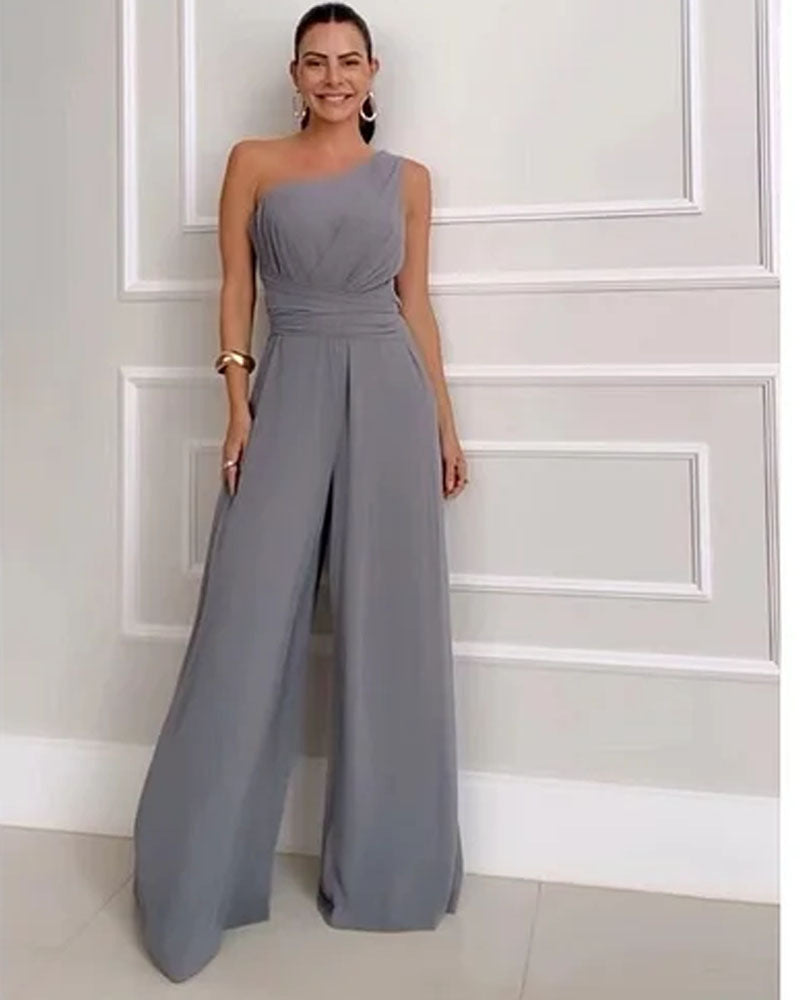 Kvinne Elegant Jumpsuit med Asymmetrisk Utringning og Flytende Stoff