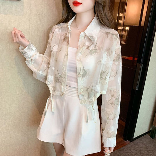 Damer transparent bluse med blomstermønster Skjora