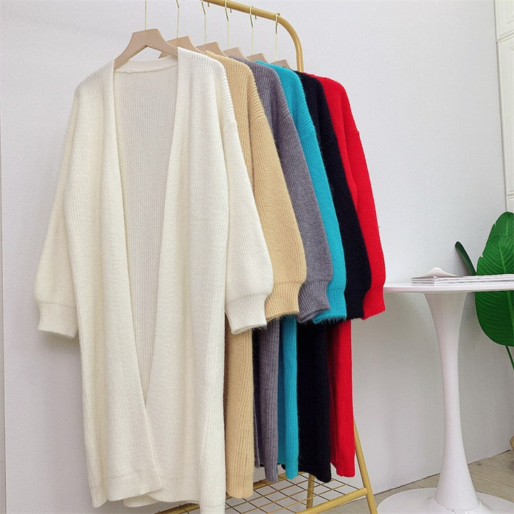 Kvinnens langermede strikket cardigan med mykt og voluminøst materiale Skjora