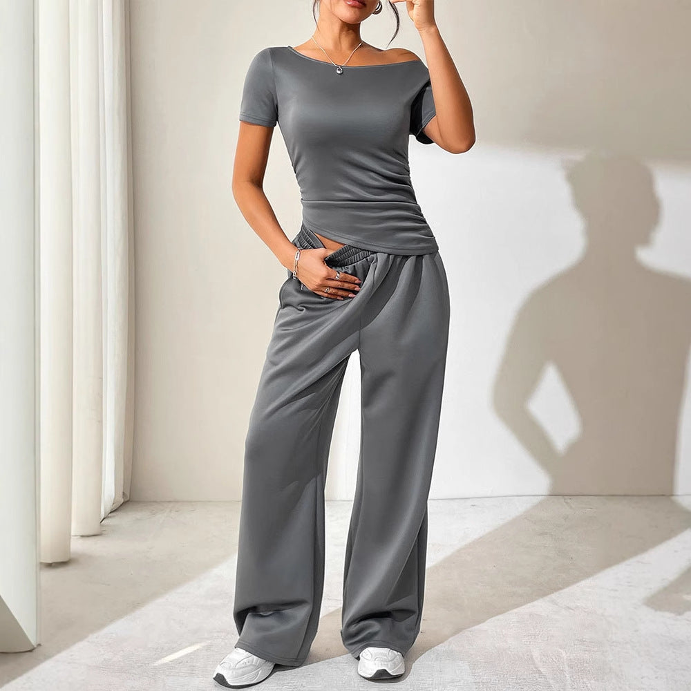 Dame jumpsuit med asymmetrisk snitt og vidbenet design Skjora
