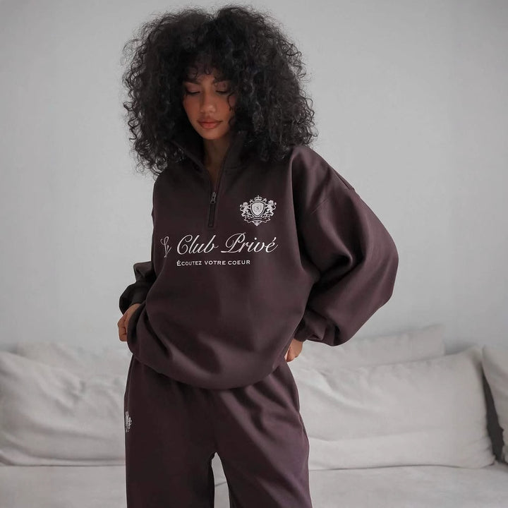 Dame avslappet genser med halvlukking og eksklusivt trykk Skjora