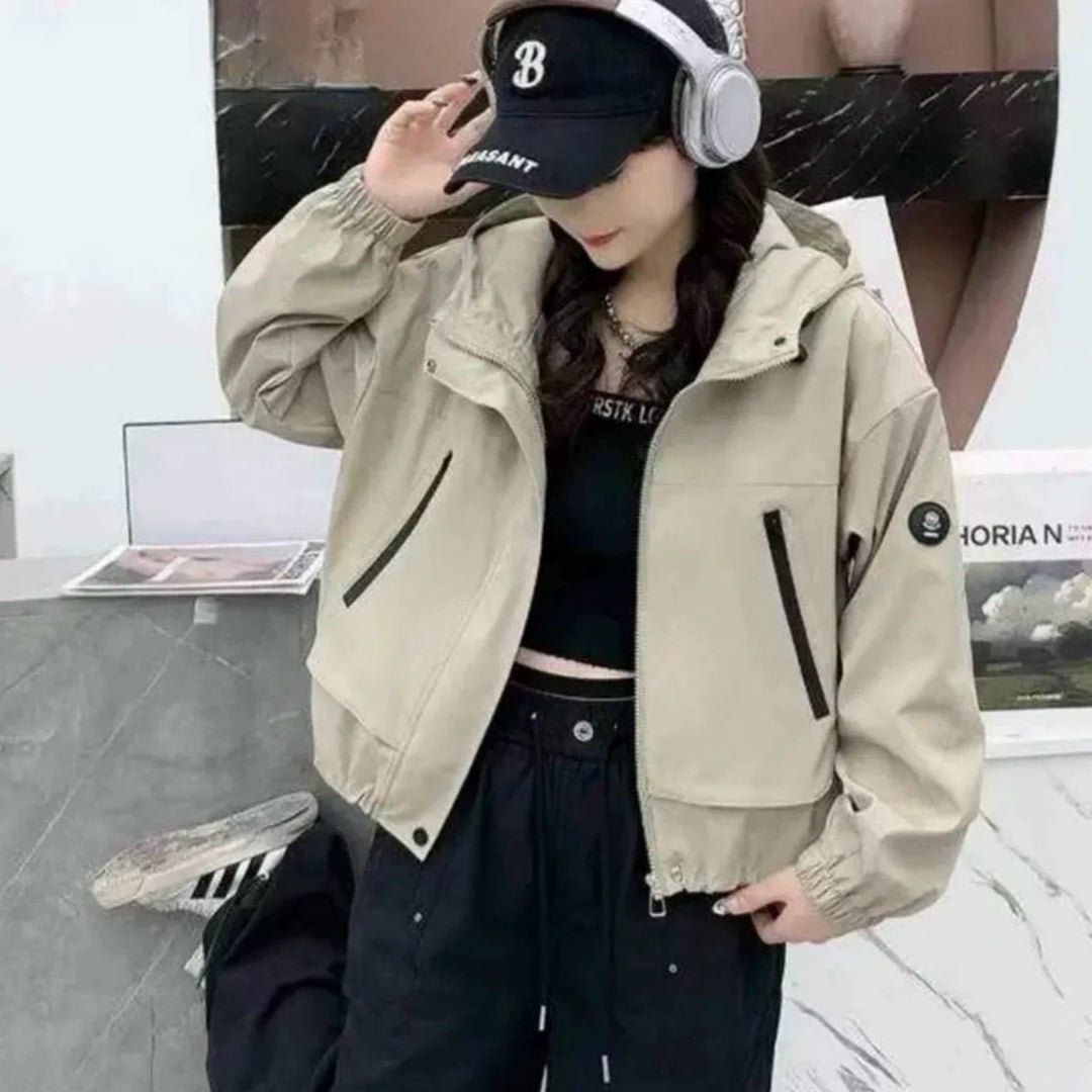 Dame sporty overgangsjakke med praktisk hette design Skjora