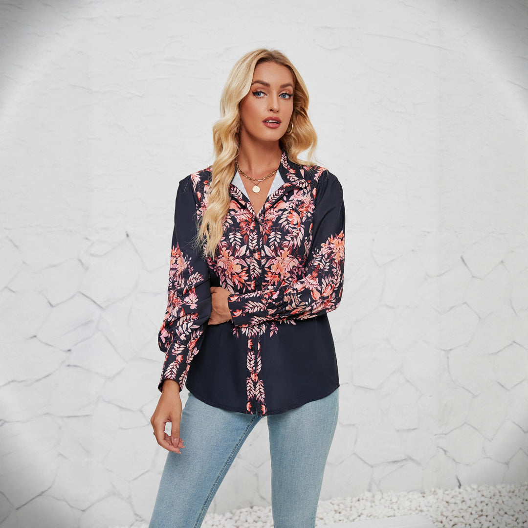 Kvinnenes elegante bluse med blomstermønster og voluminøse ermer