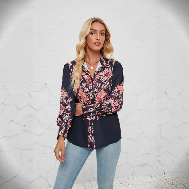 Kvinnenes elegante bluse med blomstermønster og voluminøse ermer