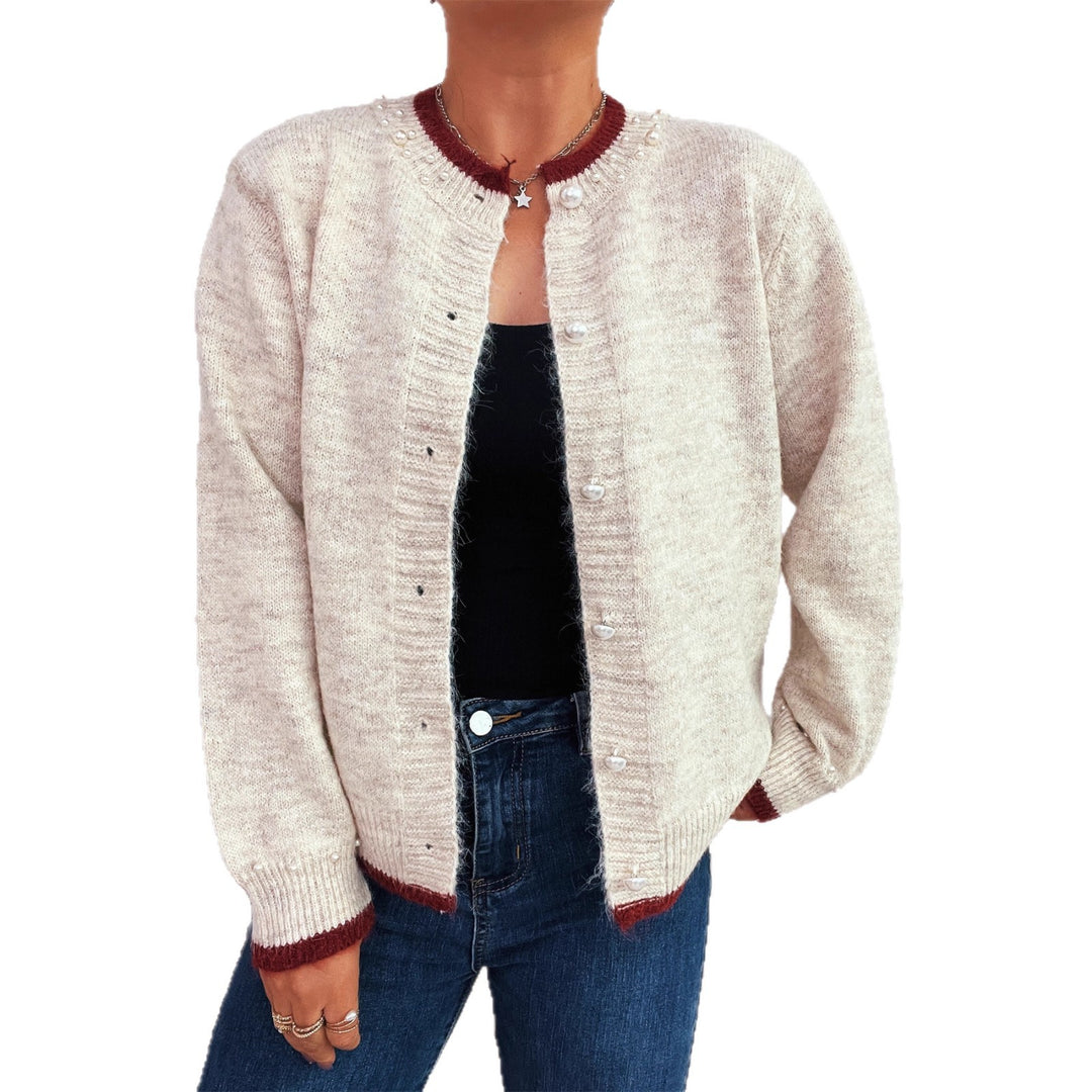 Dame elegant cardigan med dekorative knappe detaljer og perle utsmykkinger Skjora