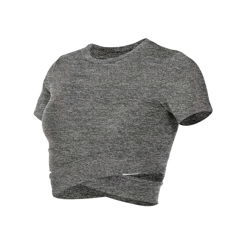 Dame kortermet trenings-crop-top med innovativt draperingsutseende Skjora