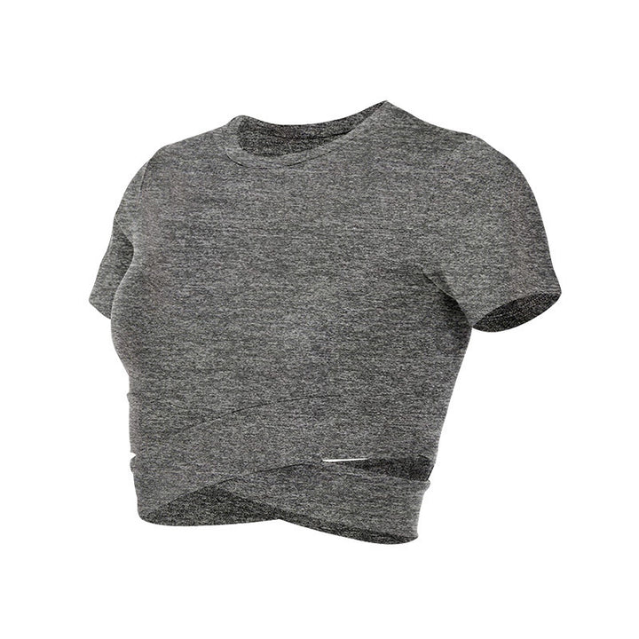 Dame kortermet trenings-crop-top med innovativt draperingsutseende Skjora