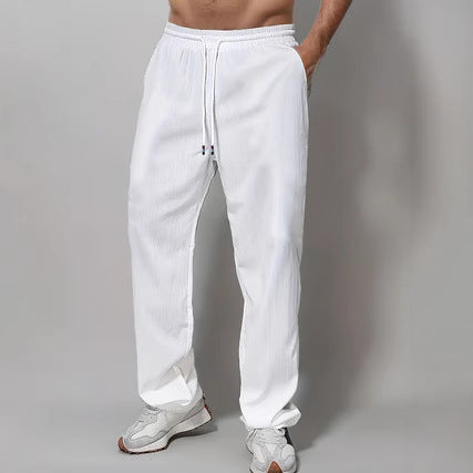 Herre Sporty Avslappet Passform Joggebukser med Elastisk Liv og Sidelommer Skjora
