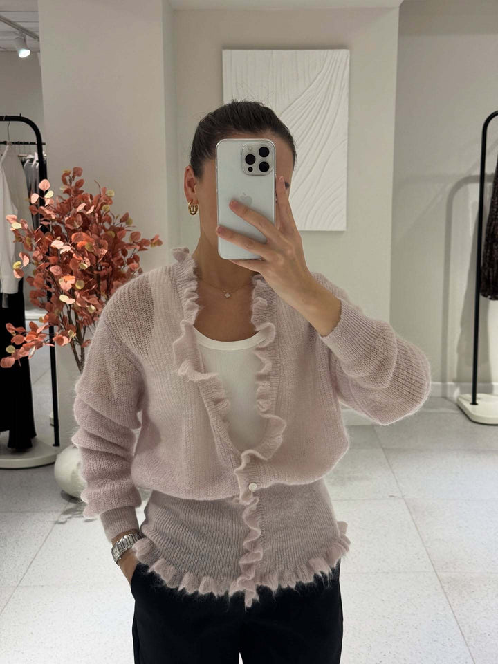 Dame cardigan med lekent volangdesign Skjora