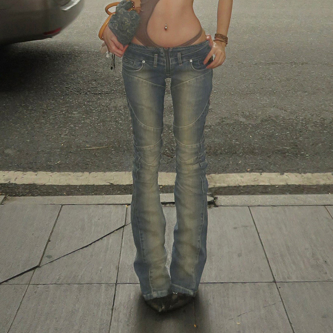 Dame Bootcut Jeans med moderne snitt og stilige slitte detaljer Skjora