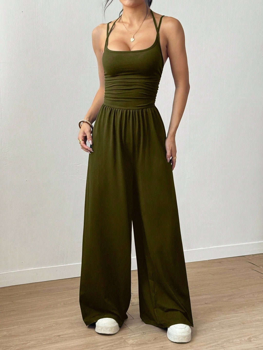 Dame luftig jumpsuit med høy midje og justerbare stropper Skjora