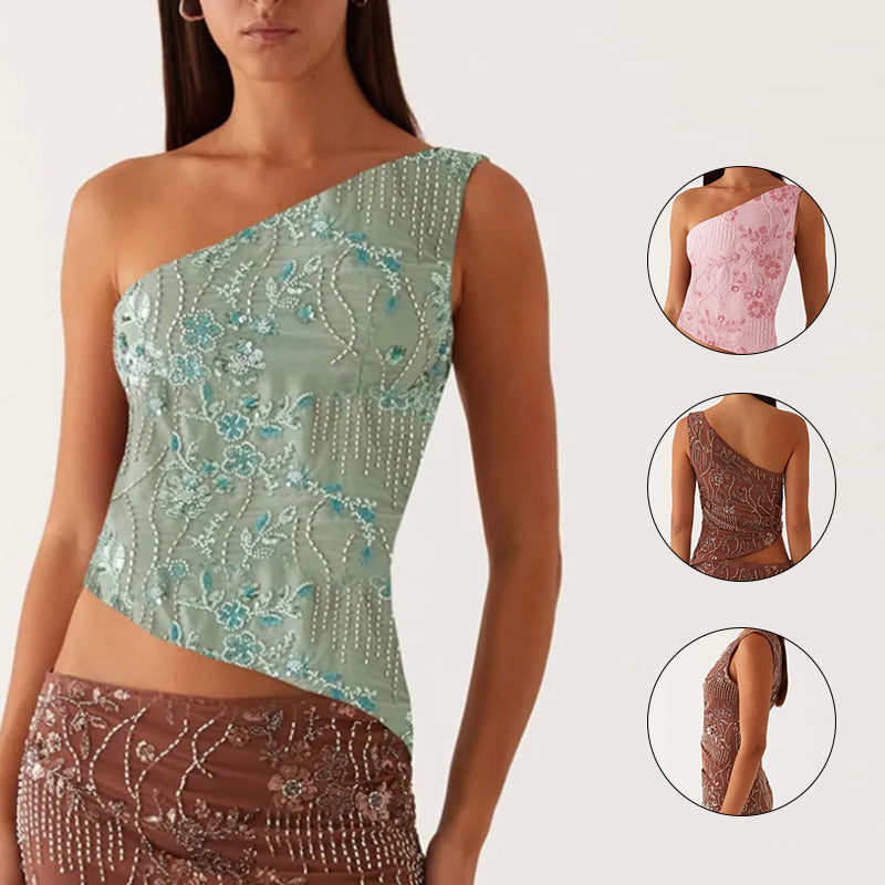 Kvinnes asymmetrisk topp med blomstret rhinestone-design Skjora