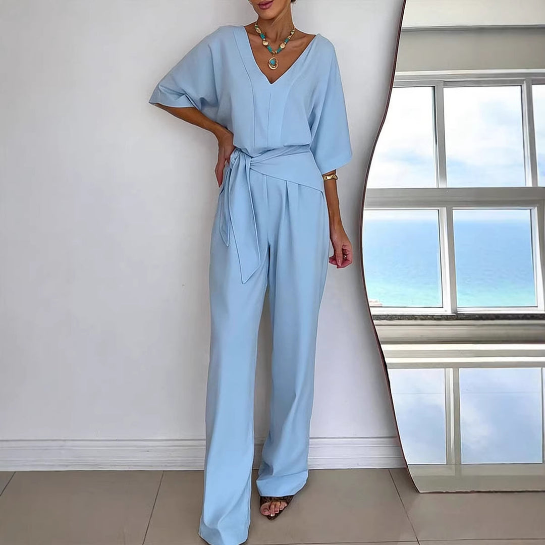 Damer Elegant Jumpsuit med Skreddersydd Snitt og Innpakket Belte Skjora