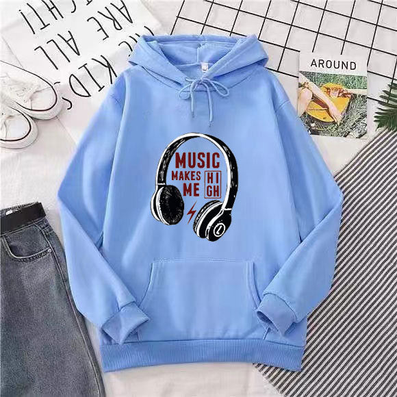 Kvinnehettegenser med kreativ musikkdesign Skjora