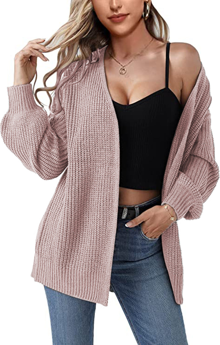 Kvinnens chunky strikket cardigan med en avslappet fasong og åpne masker Skjora