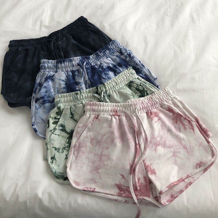 Kvinne casual sweatshorts med trendy tie-dye design og praktiske sidelommer
