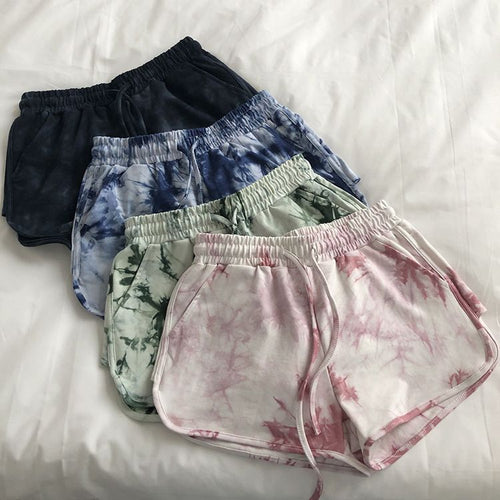 Kvinne casual sweatshorts med trendy tie-dye design og praktiske sidelommer