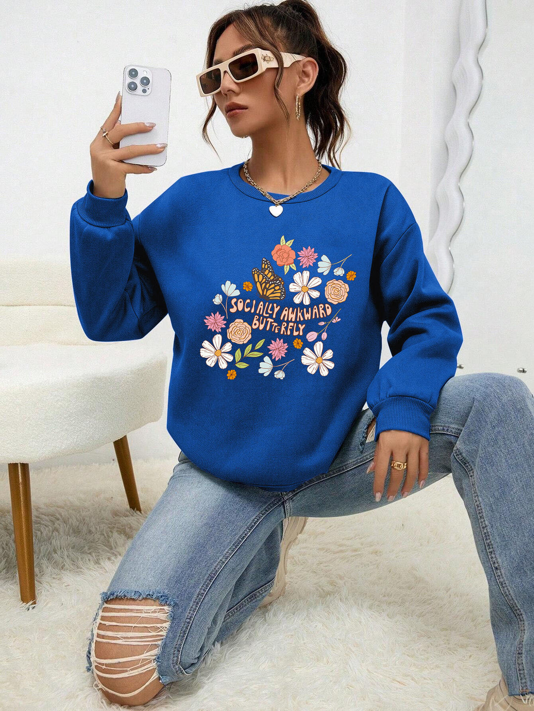 Kvinne sweatshirt med kreativt blomsterdesign og inspirerende trykk Skjora