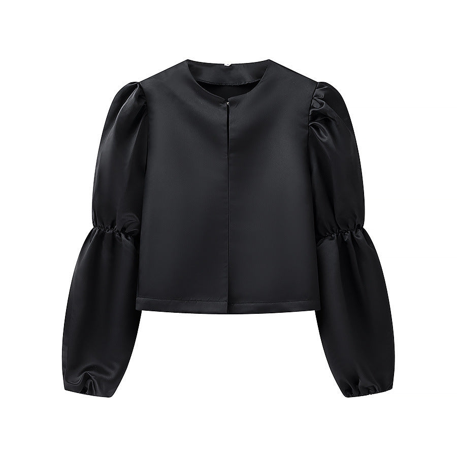 Kvinnens elegant skreddersydde bluse med voluminøse ermer Skjora