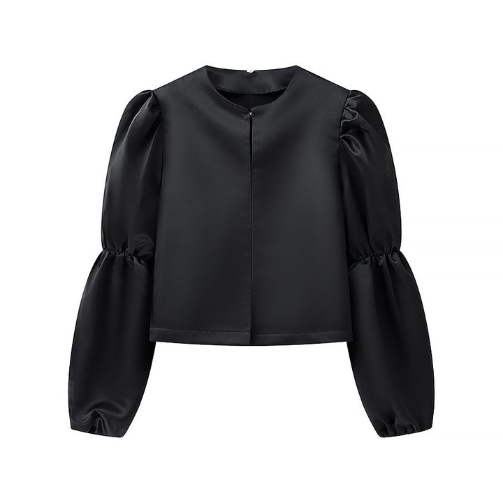 Kvinnens elegant skreddersydde bluse med voluminøse ermer Skjora