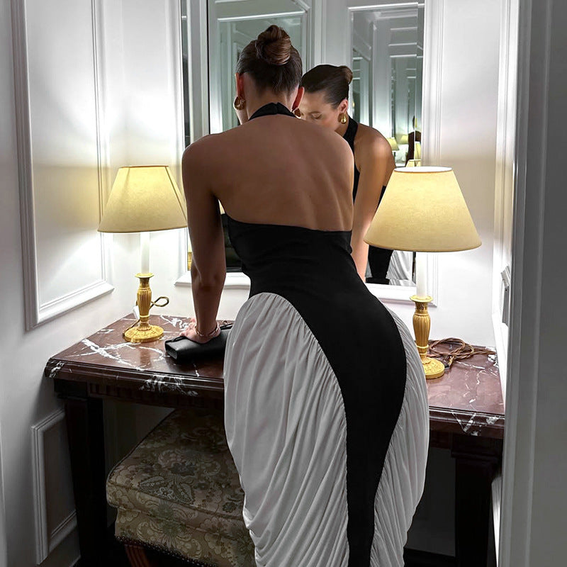 Damer Elegant aftenkjole med dyp ryggutskjæring og innovativ draperingsdesign Skjora