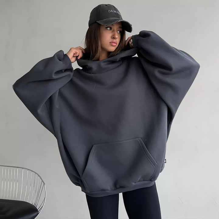 Dame Oversized Hettegenser med iøynefallende ryggtrykk Skjora