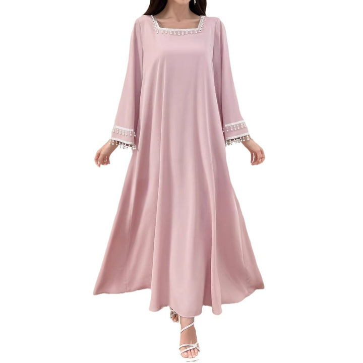 Kvinne Elegant Maxi Kjole med Dekorative Frynser og Brede Ermer Skjora
