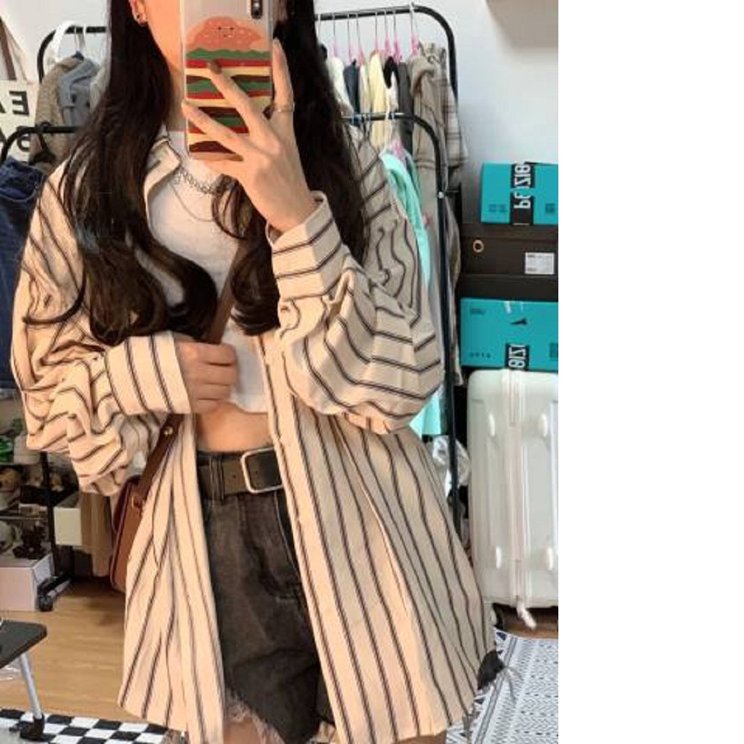 Dame stripete overskjorte bluse i en avslappet fasong med oversized ermer