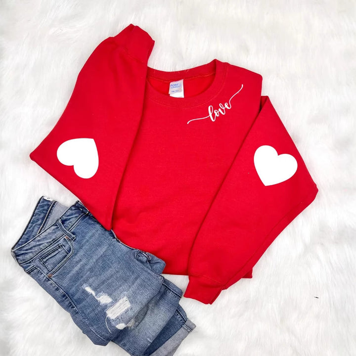 Dame sweatshirt med hjerte design og avslappet passform Skjora