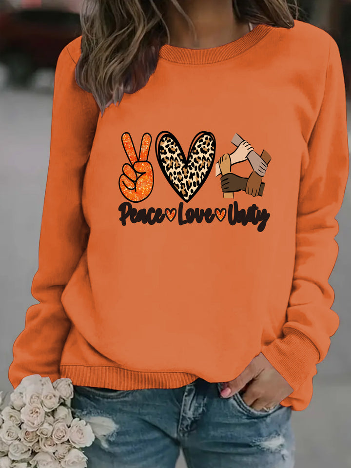 Kvinnegenser med kreativt Peace, Love & Unity-design Skjora