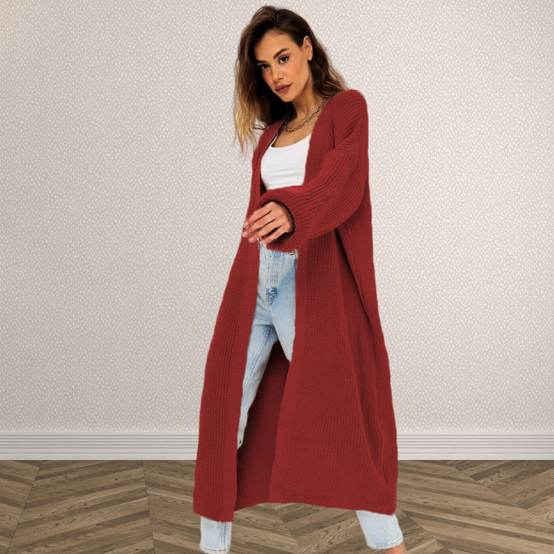 Kvinnens chunky strikk cardigan med åpen frontdesign og dype lommer Skjora