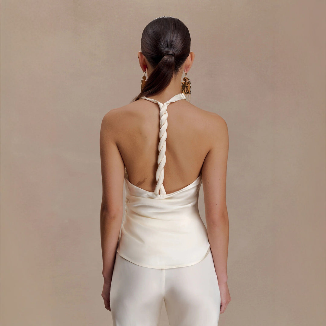 Dame Elegant bluse med asymmetrisk snitt og drapering Skjora