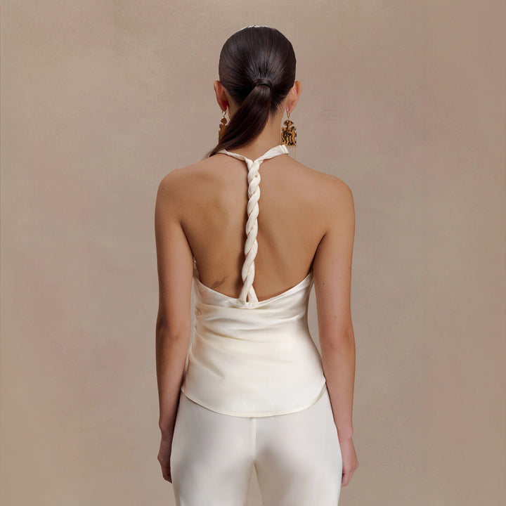 Dame Elegant bluse med asymmetrisk snitt og drapering Skjora