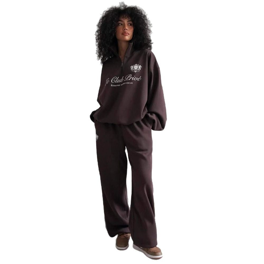 Dame avslappet genser med halvlukking og eksklusivt trykk Skjora