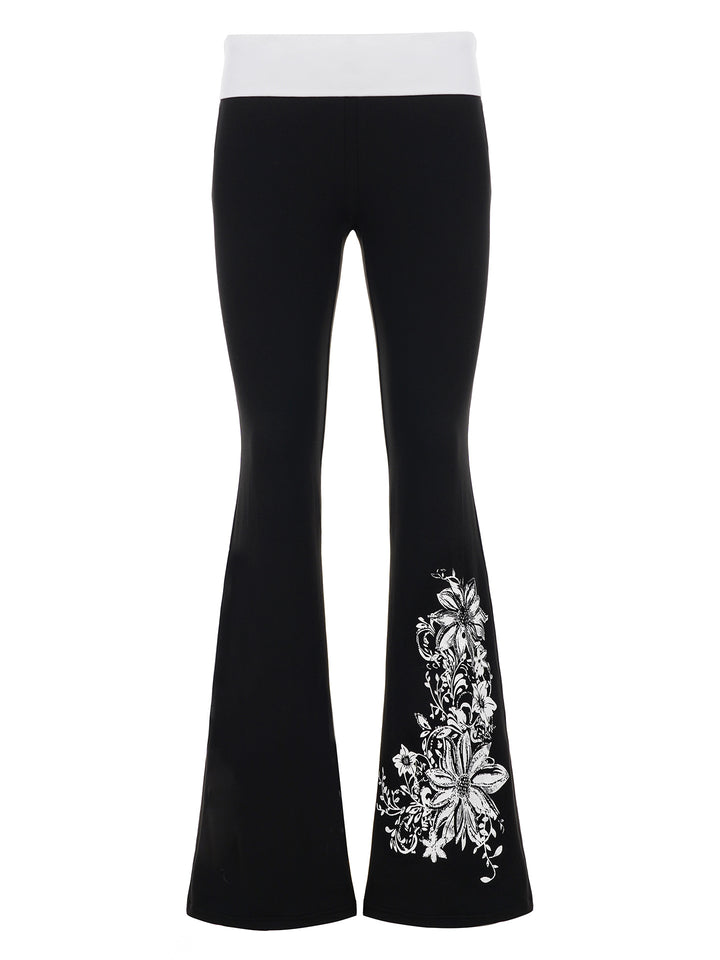 Dame Flared-Leggings med blomstermønster og høy liv Skjora