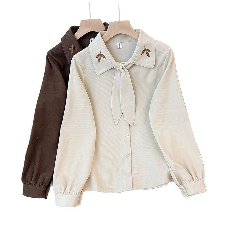Kvinnes elegant bluse med sløyfe krage Skjora