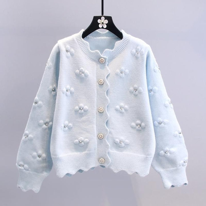 Kvinnenes koselige cardigan med blomsterapplikasjoner Skjora