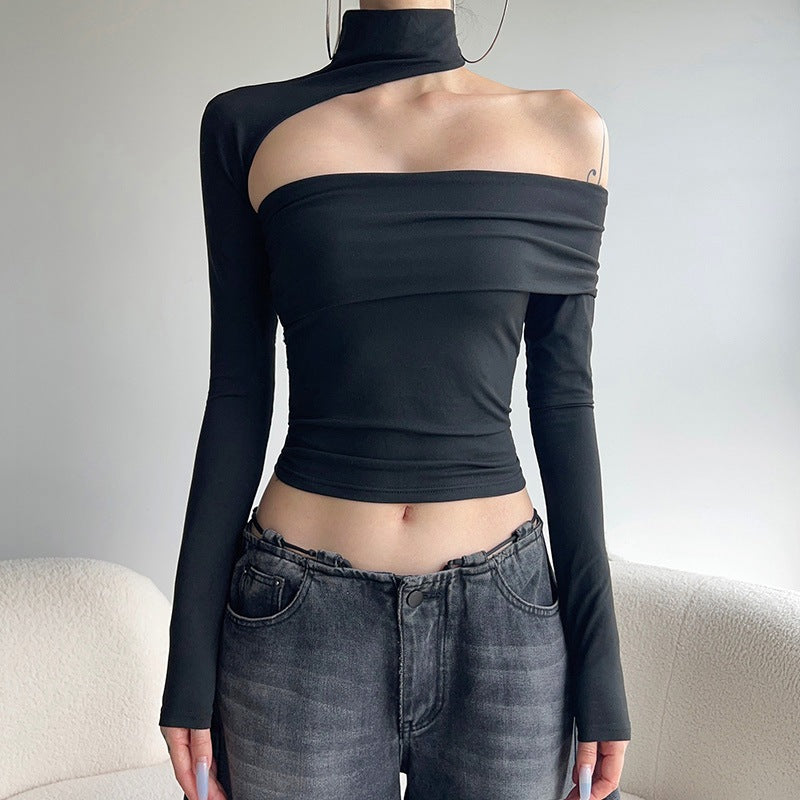 Dame moterikt topp med asymmetrisk snitt og elegant volangdetalj Skjora