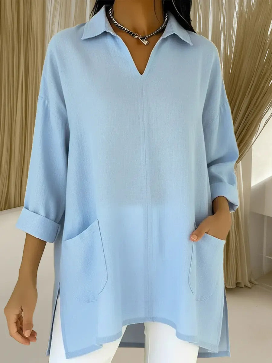 Dame langermet bluse med elegant V-hals og praktiske lommer Skjora